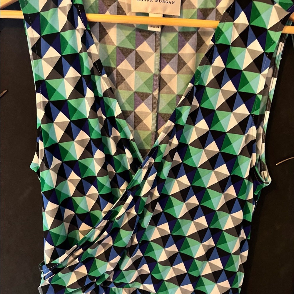 Faux wrap dress green and blue geometric pattern